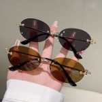 跨境新款太阳镜女士椭圆形网红凹造型墨镜无框切边潮流眼镜男