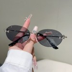 跨境新款太阳镜女士椭圆形网红凹造型墨镜无框切边潮流眼镜男