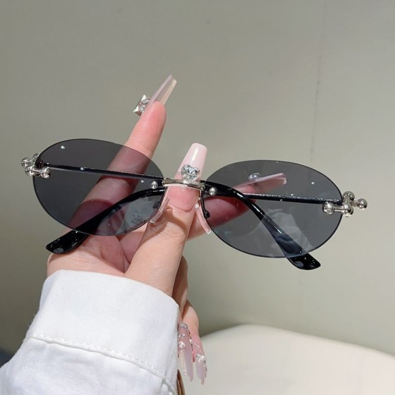 跨境新款太阳镜女士椭圆形网红凹造型墨镜无框切边潮流眼镜男