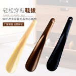 厂家直销多款家用塑料小鞋拔鞋抽易收纳提鞋器懒人可印商标