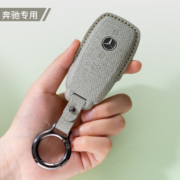 适用2023款奔驰e300l钥匙套glc260男女A/C级扣e260li翻毛皮包车内