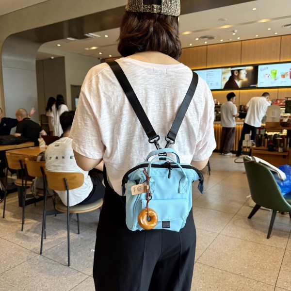 时尚潮流多巴胺牛津布双肩包女轻便斜挎小背包日常百搭出游小书包