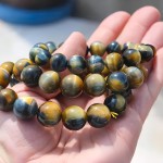 天然梦幻虎眼石手链 收藏级金蓝共生木变石东海可塘批发文艺复古
