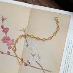 描金珐琅彩桃花黄粉手链女轻奢小众高级感设计手饰首饰批发直播款