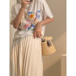 草编水桶包女2026夏季时尚网红个性打结手提包斜挎编织包包女包包