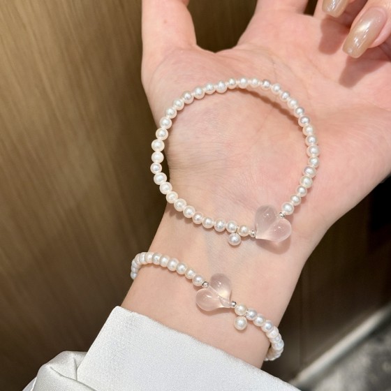 s925银天然淡水珍珠手饰蜜桃粉晶爱心手链小众招桃花温柔少女首饰