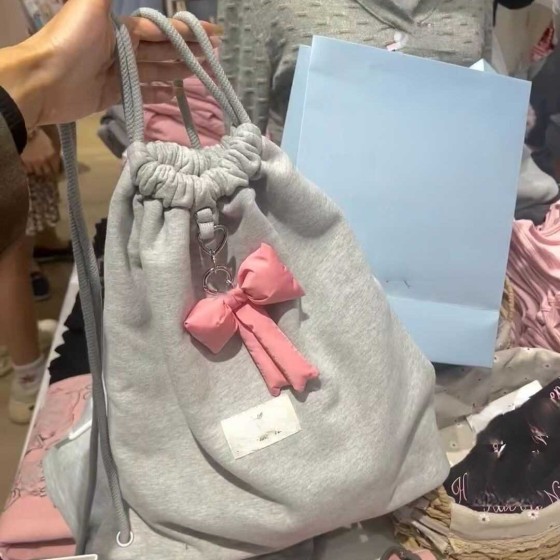 蝴蝶结抽绳休闲双肩包女生春夏简约休闲小众背包韩国百搭运动小包