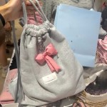 蝴蝶结抽绳休闲双肩包女生春夏简约休闲小众背包韩国百搭运动小包