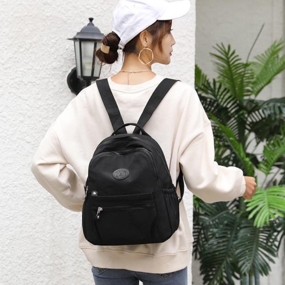 加厚帆布新款双肩包简约女高级尼龙书包时尚轻便休闲旅行背包户外